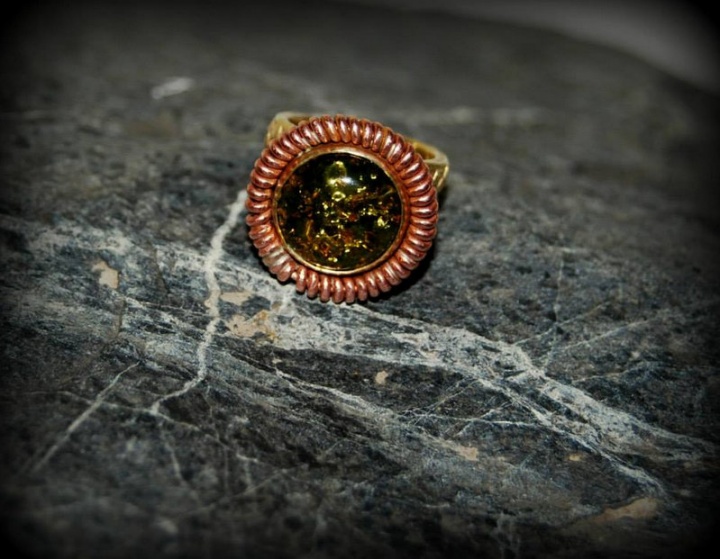 Brass flower with amber