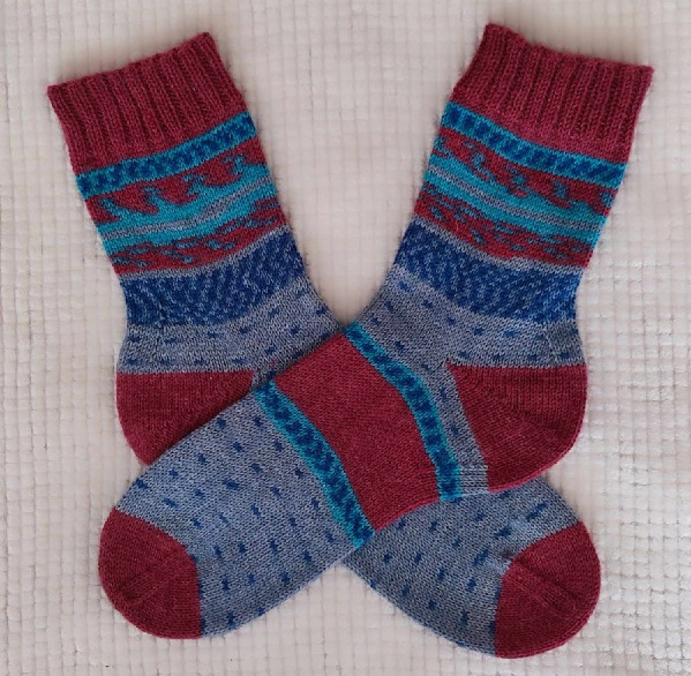 Handmade knitted woolen pattern socks.