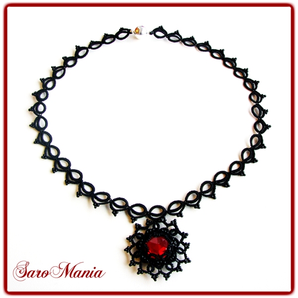 Black necklace with red cabochon