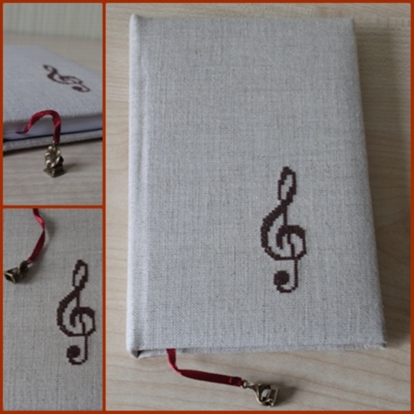 Linen embroidered booklet violin key