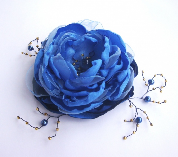 Brooch-flower. Blue with a sprig