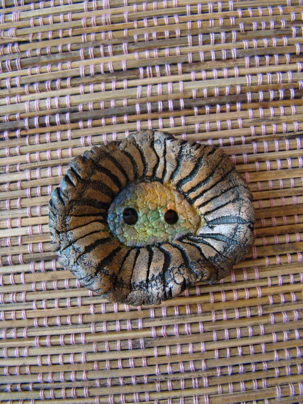 Aged clay buttons