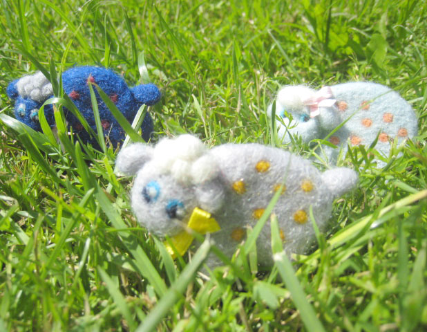 Three sheep in a meadow