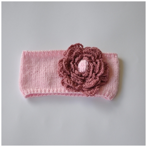 Pink headband with a flower