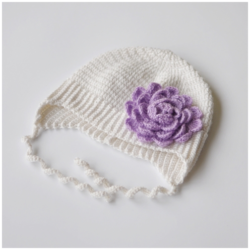 White hat with purple flowers