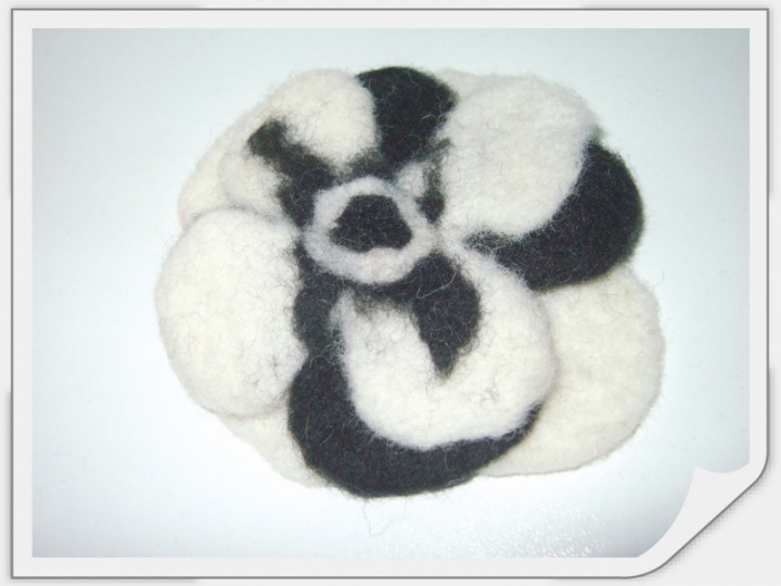 Black and white brooch