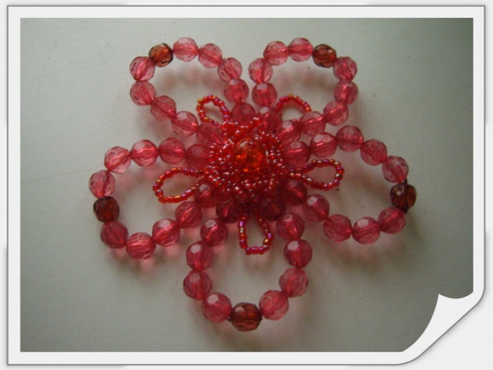 Red brooch