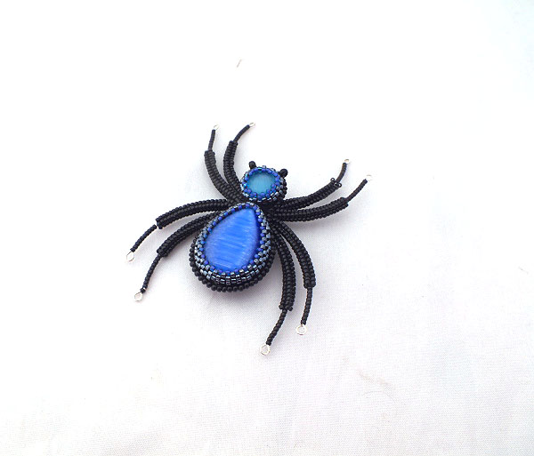 Blue brooch - spiders
