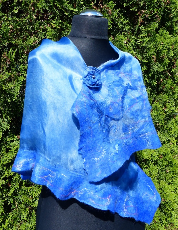 Coated with a silken shawl -Zibute