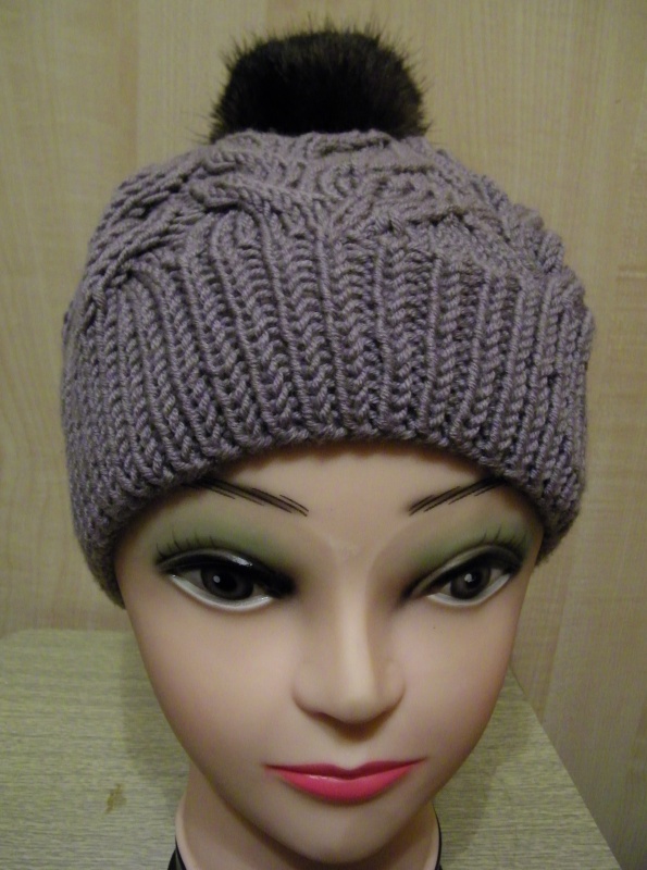 Grey hat with black pompons