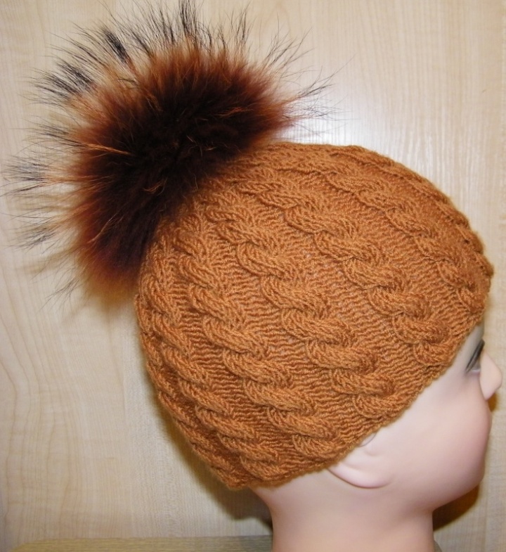 Brown hat with pompons of foxes