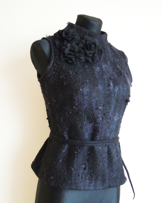 Female vest decorated with curls