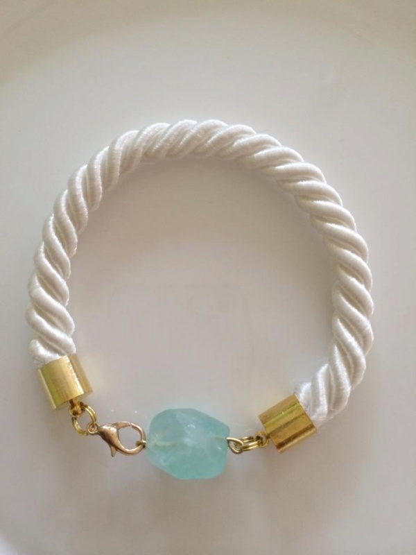 White rope bracelet with aquamarine.