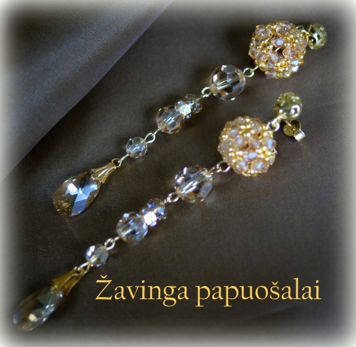 Decorated in gold and crystal earrings