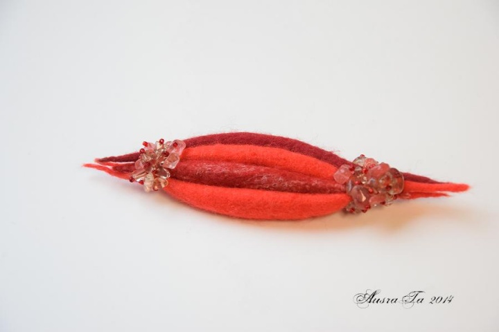 Red brooch