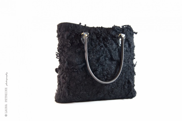 By manual black ringlets