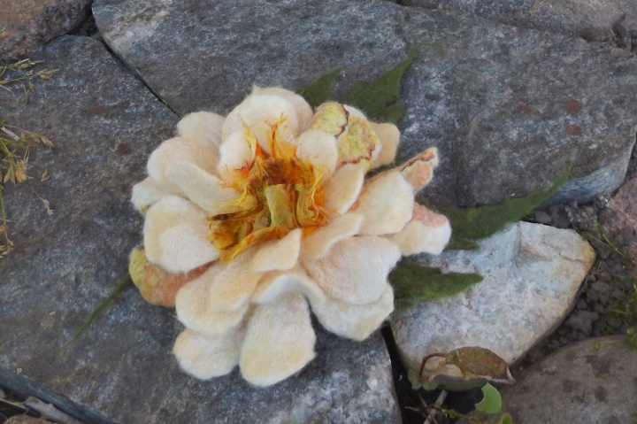 Felted brooch cream-colored