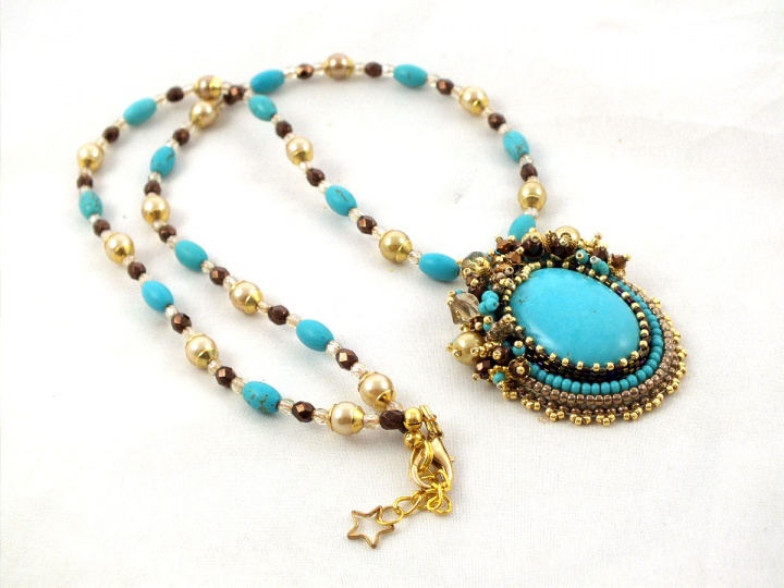 Bead embroidered turquoise pendant