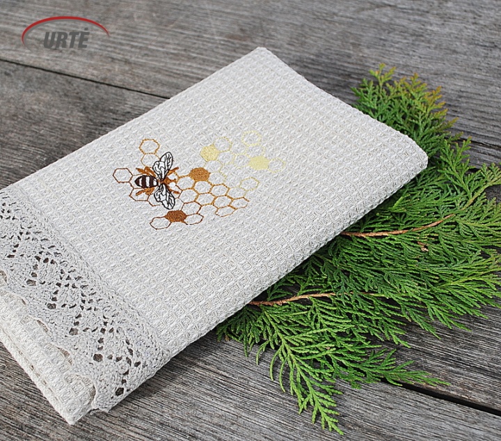 Linen kitchen towel with bee and crochet corner