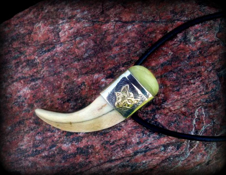 Pendant with a wolf