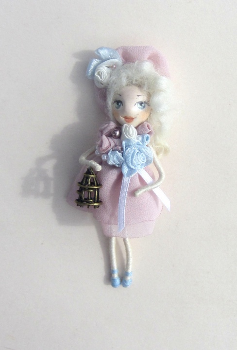 Girl with a bird cage (Doll brooch)