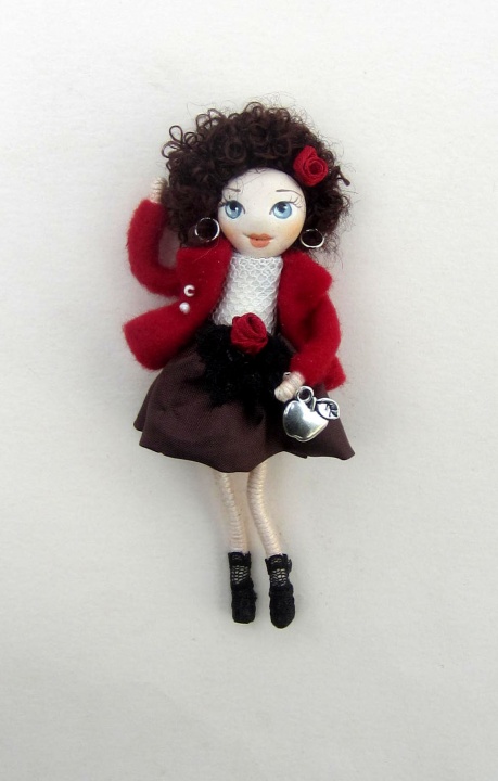 Girl in a red jacket (brooch)