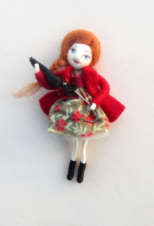Girl with umbrella (brooch doll)
