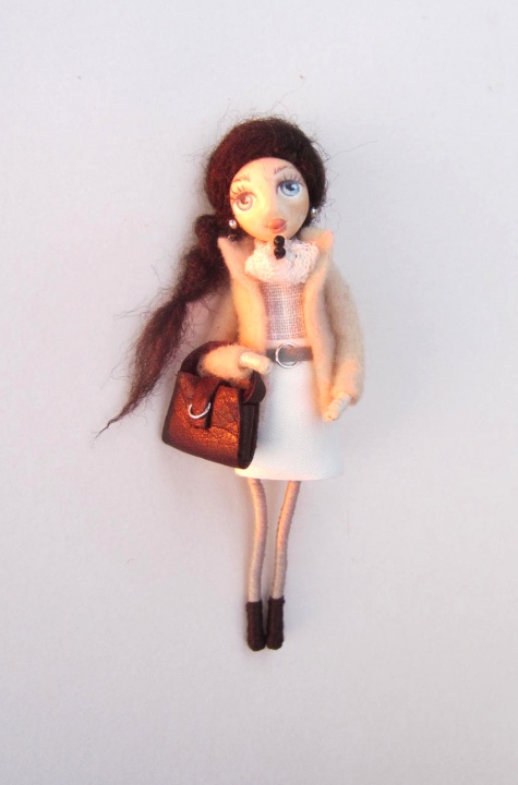 Doll brooch "Girl with black hair"