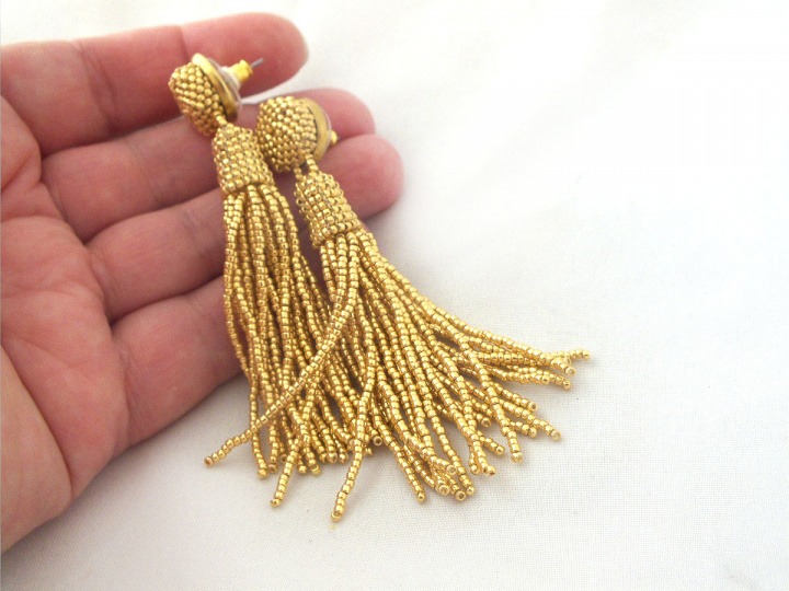 Gold beaded tassel earrings