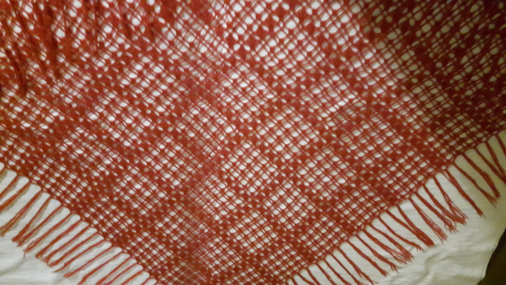 red triangular scarf
