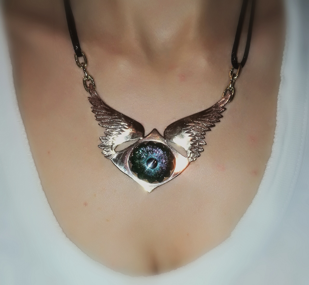 Pendant of Angel with eye.