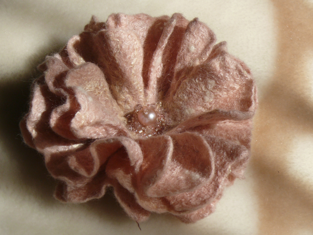  Felted flower brooch.