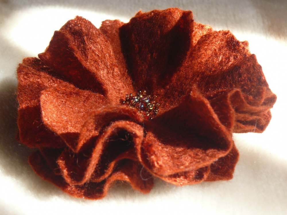 Felted flower brooch.