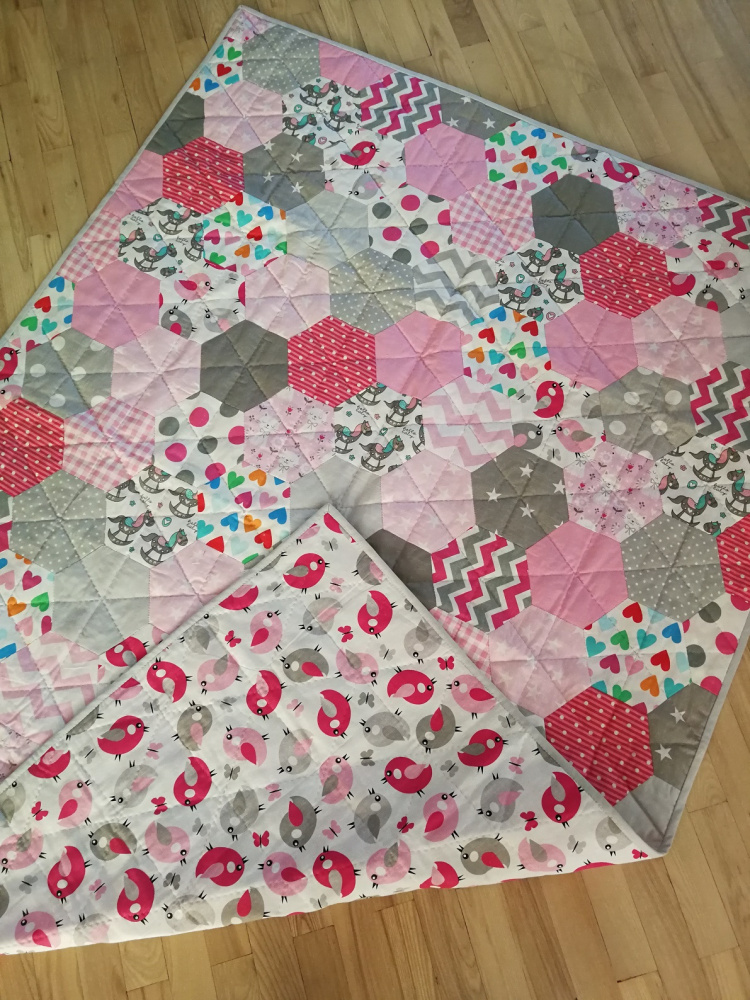 Handmade quilt for a girl