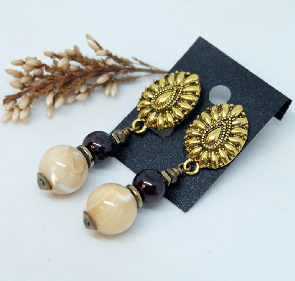 Pearl (shell mass) earrings with garnet...