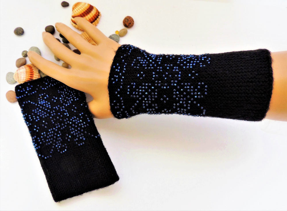 Hand-knitted black wristbands with beads