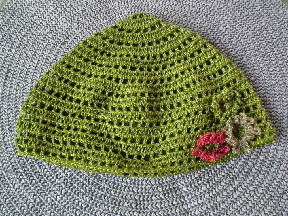 Green hat. Handmade crocheted hat for an adult
