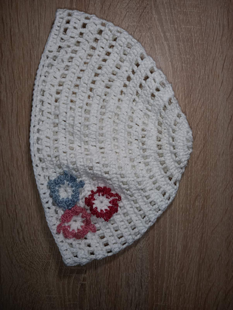 White hat1. Handmade crocheted hat for an adult