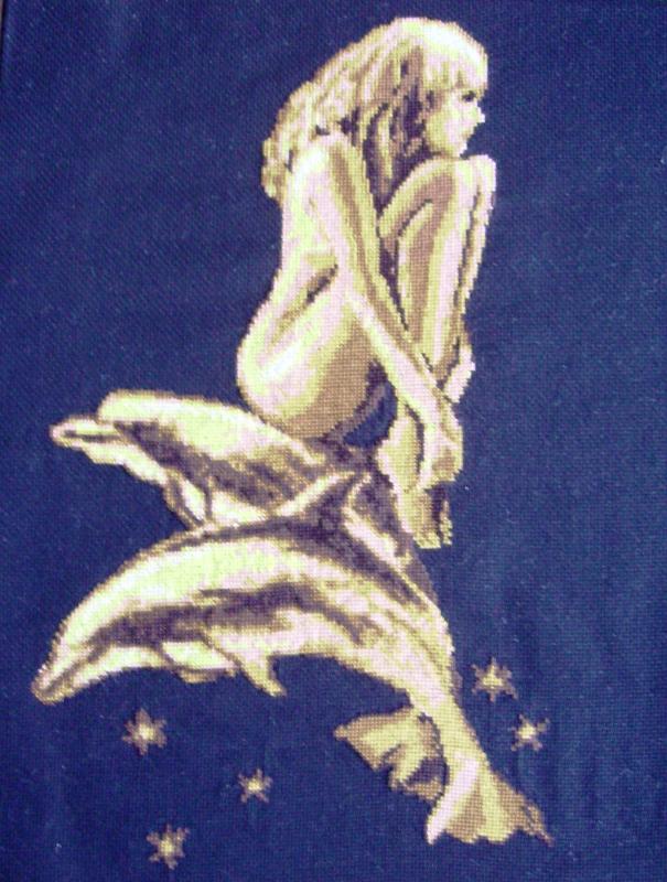 Girl with dolphins