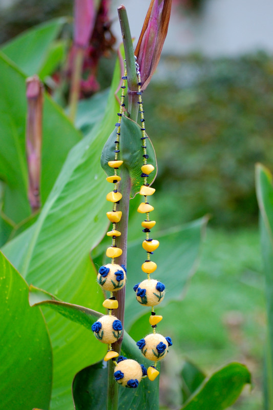 Blue roses, yellow necklace :)