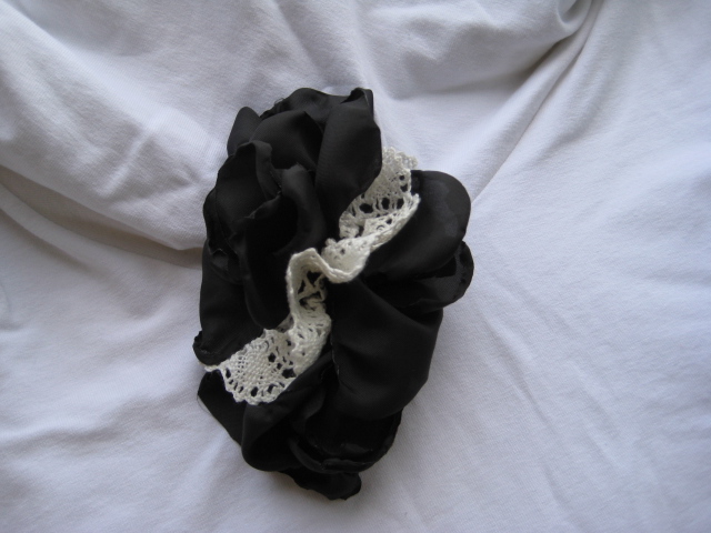 Black brooch with lace