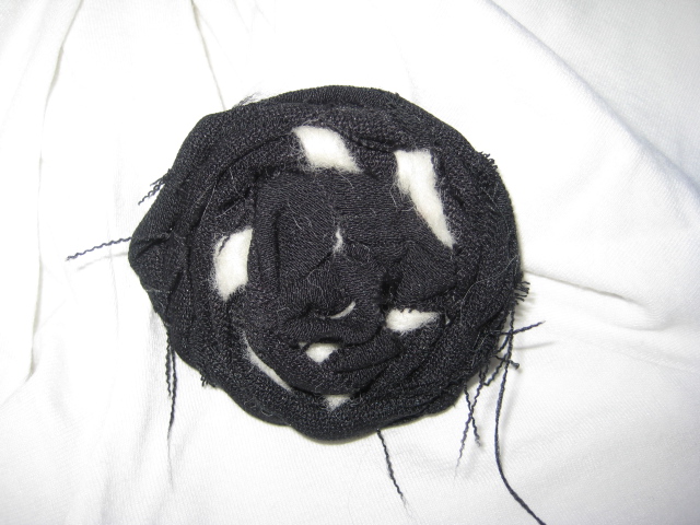 textile brooch