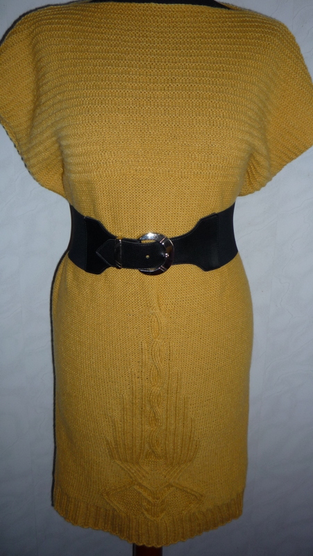 a bright yellow dress without sleeves