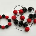Red with a black embroidered - Kits - felting