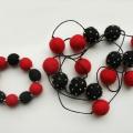 Red with a black embroidered - Kits - felting