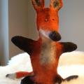 felting processes on the hand placed plaything pup - Dolls & toys - felting