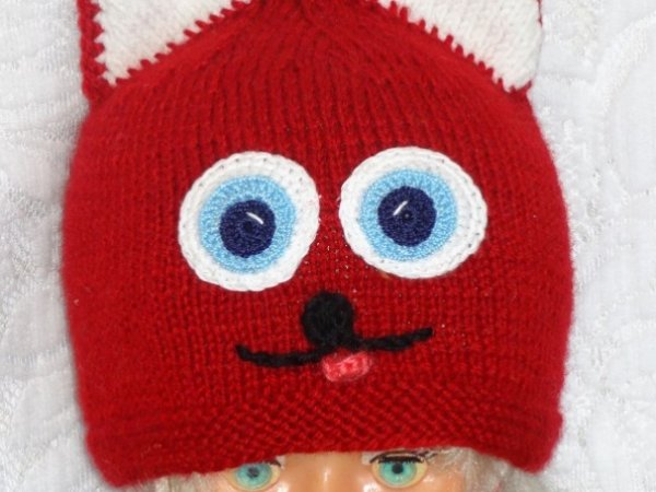 Red hat with cat ears by white - Hats