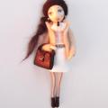 Doll brooch "Girl with black hair" - Accessory - making