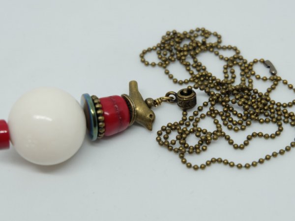  Pendant on the neck with a bird - Neck pendants