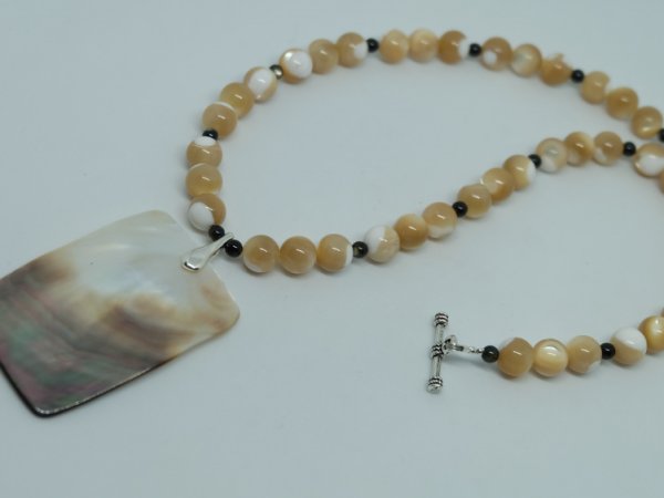 Necklace with a pendant made of shell beads - Necklace